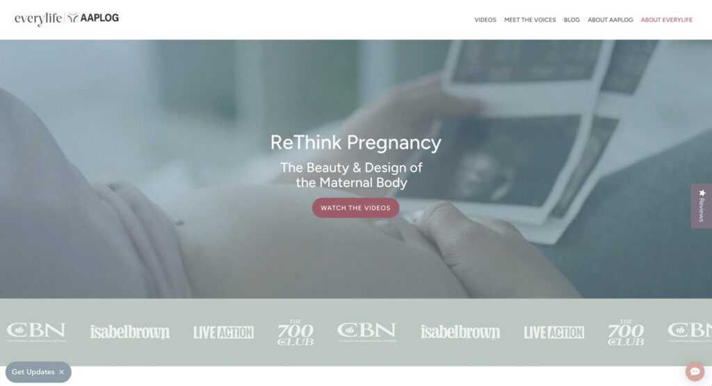 Hero banner for a pregnancy-focused site: soft-focused image of a pregnant belly with hands, overlaid by the headline “ReThink Pregnancy” and subheading “The Beauty & Design of the Maternal Body” with a pink “Watch the Videos” button above a logos bar at the bottom section.