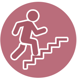 Icon of a person climbing a staircase inside a circular maroon badge.